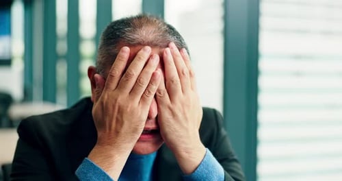 Businessman, headache and stress in office for mistake, exhaustion and overworked with anxiety