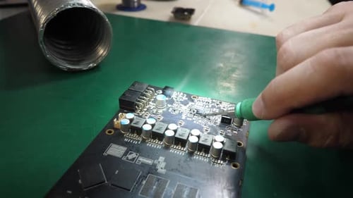 Soldering Iron Repairing Computer Circuit Board