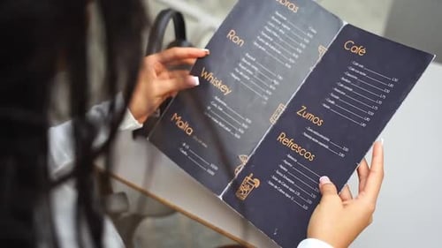 Closeup Hand of Elegant Woman Hold Menu Restaurant Beverage Lunch