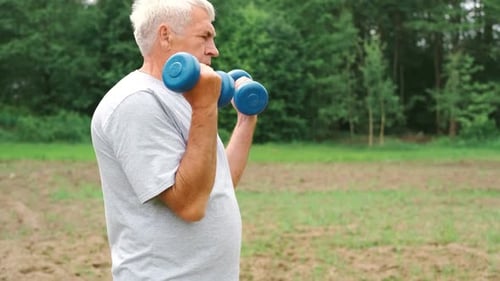 Senior Man Working Out Outdoors Person Lifting Dumbbells Old Male Exercising at Park Healthy People