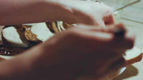 Preparing Fish Sandwiches With Tomatoes And Cucumbers