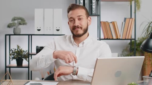 Business Man Showing Time on Wrist Watch Clock Approve Pointing Finger Time to Start Work Deadline