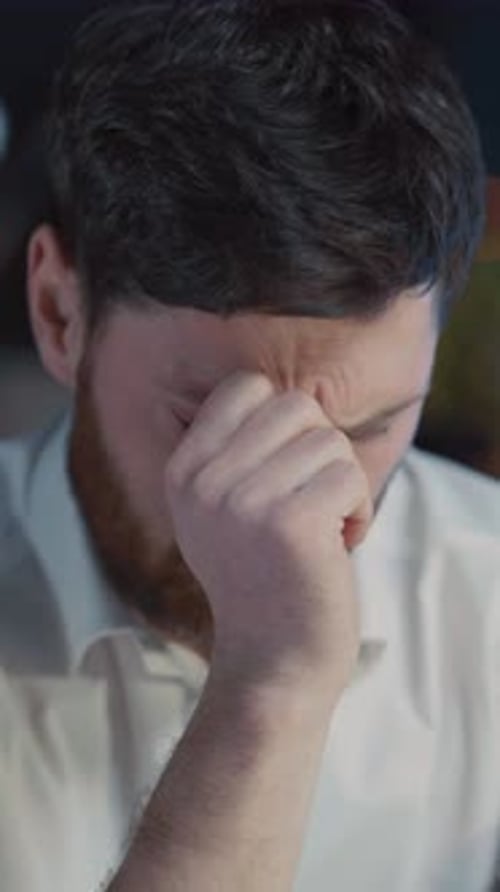 A Man Reflecting Deep Emotion During a Thoughtful and Introspective Moment in Life