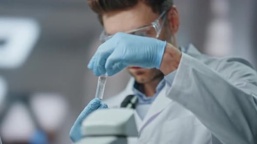 Technician Taking Test Tubes Making Scientific Investigation Laboratory Close Up