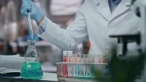 Microbiologist Hand Holding Pipette Working at Pharmacology Clinic Lab Close Up
