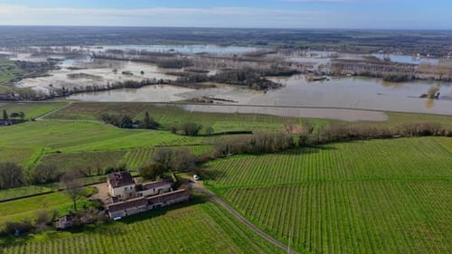 Aerial view of floodwaters engulfing fields, Sainte-Croix-du-Mont, France.