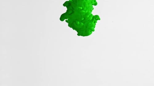 Green Ink in Water on a White Background Filmed on a Highspeed Camera at 1000 Fps
