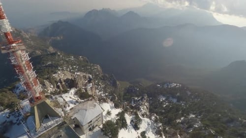 Beautiful Morning on the Huge Mountain Range with a Broadcast Tower on Top