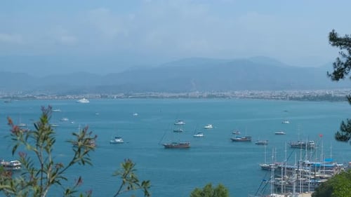 Pierces with Boats in Bay