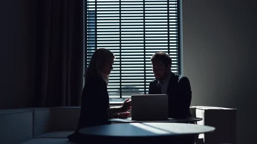 Company Ceo Having Meeting with Manager in Boardroom and Discussing Performance