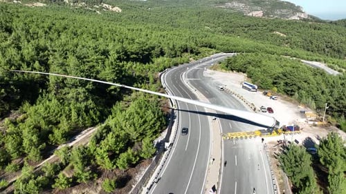 Aerial View Of Wind Turbine Transported On Highway