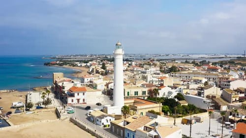 Lighthouse Between an Ancient City and the Port