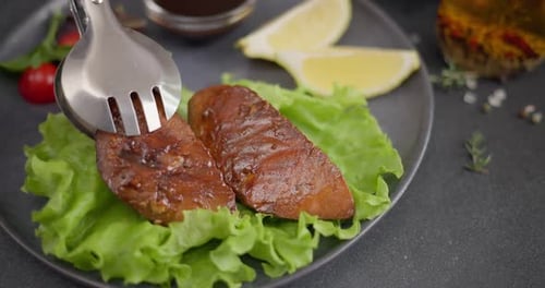 Glistening Cooked Fish on Lettuce Bed with Garnish