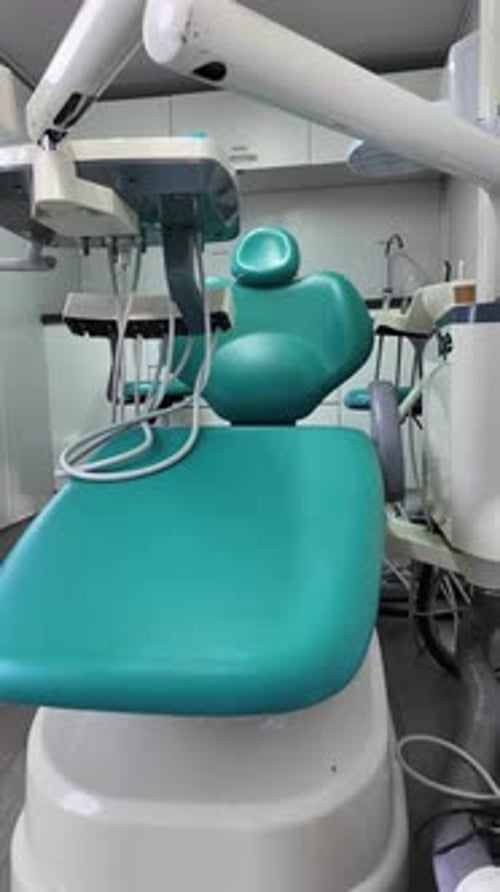 Closeup of Modern Dentist Chair in Clean Clinic