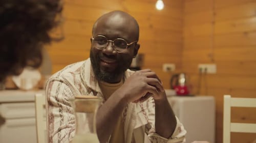 Father and Child Enjoying Breakfast Together Indoors