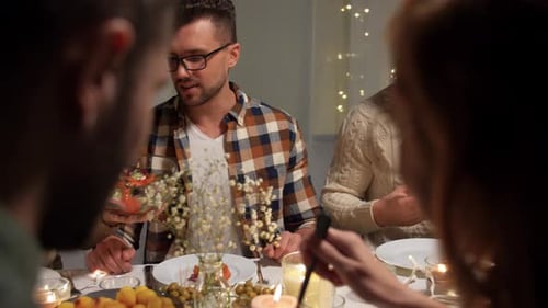 Friends Celebrate Together at Candlelit Dinner Party