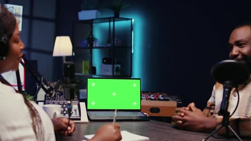 Chroma Key Notebook Between Man and Woman Meeting in Studio to Film Online Show
