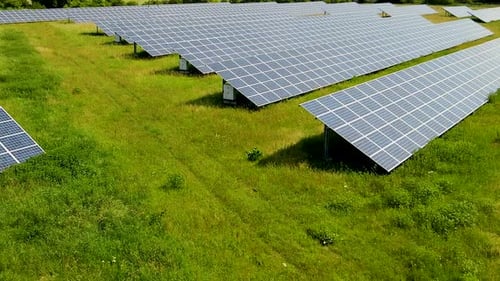 4K Aerial Drone View of Renewable and Sustainable Photovoltaic Solar Panels