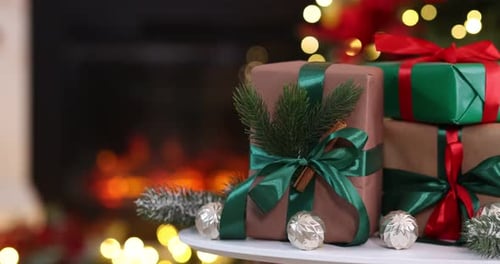 Christmas Gifts with Tree and Fireplace Background