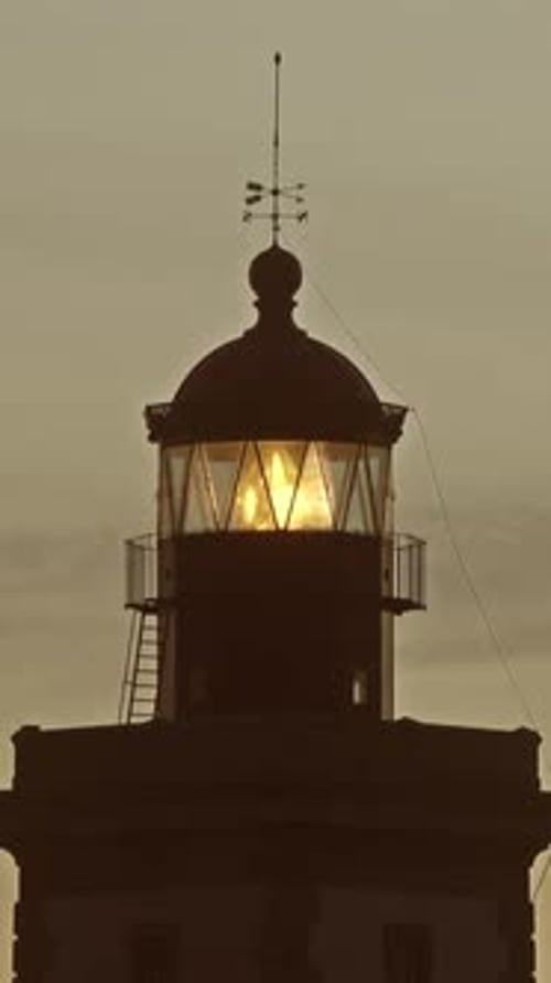 Lighthouse Lighting in the Twilight at Sunset