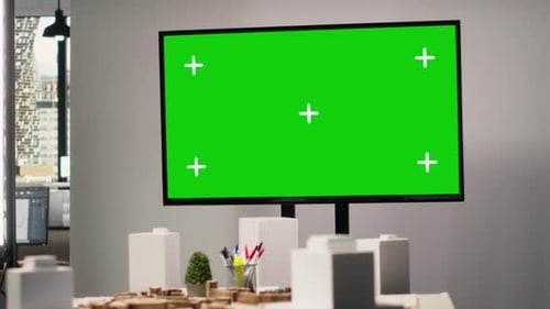 Empty Real Estate Office with a Huge Isolated Green Screen TV in Innovation Hub