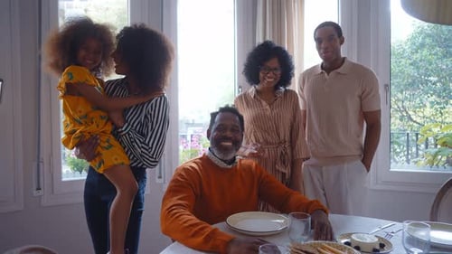 Happy Multigenerational Family Gathered Together Indoors