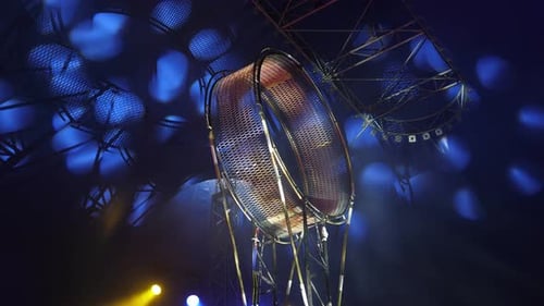 A Huge Rotating Wheel of Death on Which Acrobats Perform in the Circus