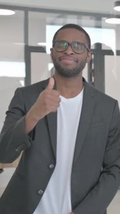 Portrait of Teammates in Office with Thumbs Up, vertical video