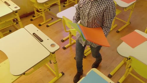 Distributing Colorful Paper in Empty Classroom