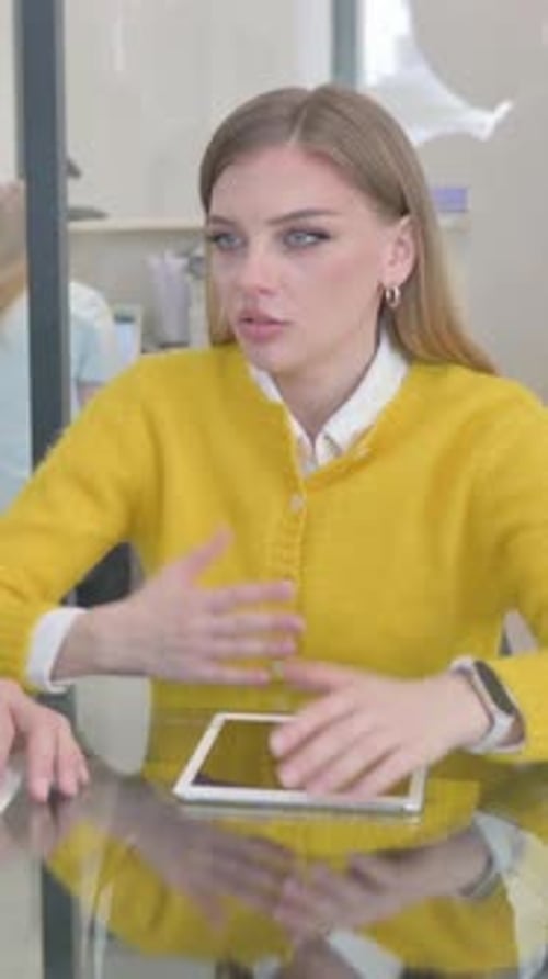 Team of Young Entrepreneurs Talking in Office, vertical video