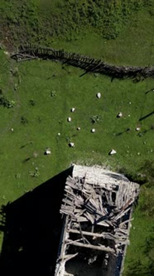 Vertical Drone Shot of Abandoned Stone Tower in Albania