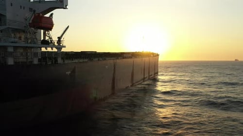 4K(24fps) Fly into panamax size bulk carrier vessel.