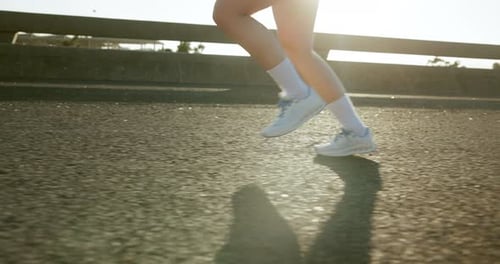 Running, fitness and shoes of person in city for workout, marathon training and exercise