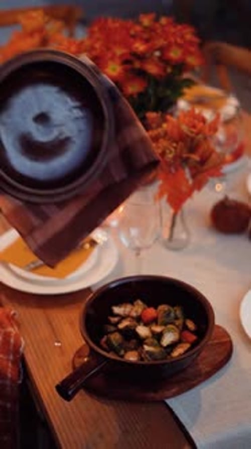 Opening Steaming Vegetables at Dinner Table