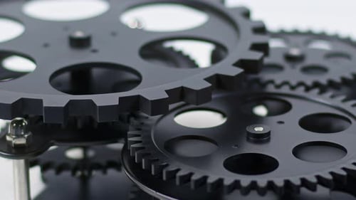 Black Gears Turning Close Up Mechanism