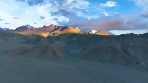 Majestic Mountain Range Aerial View at Sunset