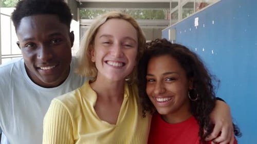 Smiling Friends Posing Together Indoors