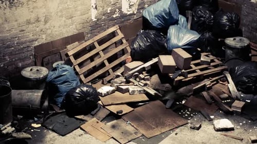 Urban Alley Garbage Pile with Dirty Walls