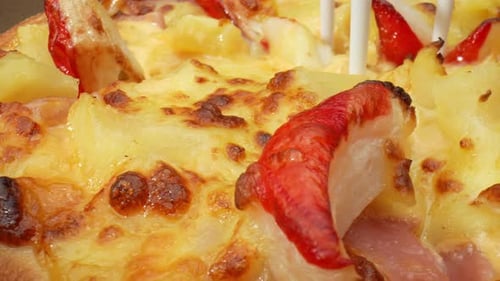 Close Up of Cooked Pizza with Toppings