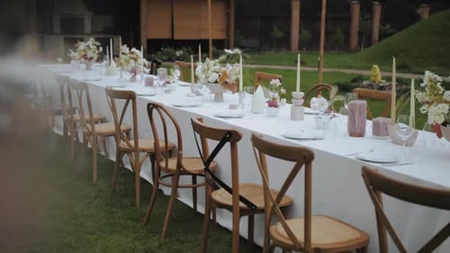 Wedding Reception Table in Lush Outdoor Setting