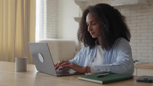 Tired Student Can't Focus on Her Work on a Laptop and Closing It