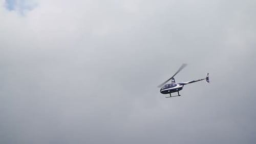 Novosibirsk Russia - July 31 2016: Helicopter in Air. Fly in Grey