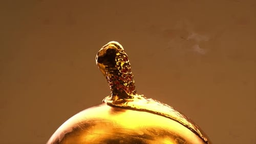 The Gold Brain Melts and Spreads Over the Gold Sphere