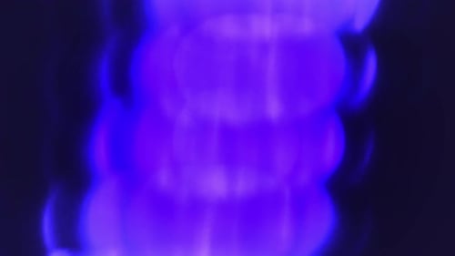 Purple light glows in darkness