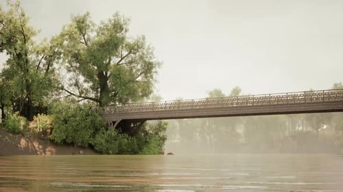 Serene River View Featuring a Vintage Bridge Surrounded By Lush Trees