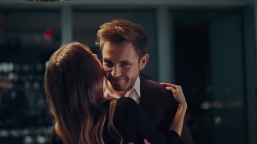 Loving Couple Embracing in a Modern Urban Apartment