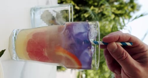 Refreshing Tropical Beverage with Fruit and Ice