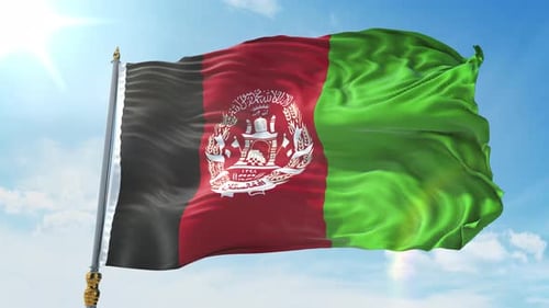 Waving Afghanistan National Flag Against a Clear Blue Sky