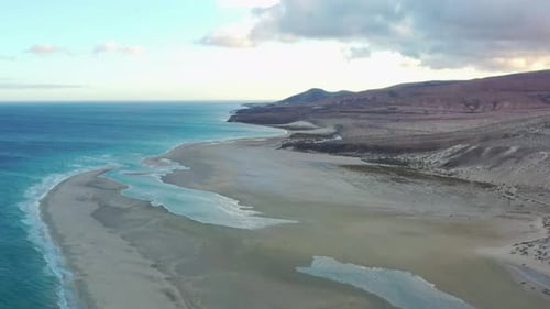 Golden Sunset Aerial View of La Barca Beach, Fuerteventura