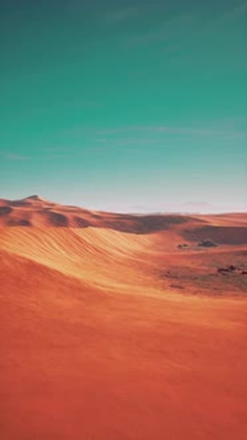 Red Desert Landscape Under Blue Sky